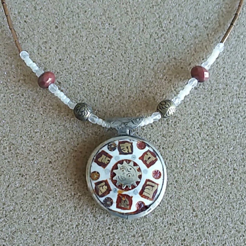 Silver sun pendant
